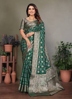 Attractive These Festive And Party Wear Saree in Fine Colored.These Saree And Blouse is Fabricated On Satin Silk.Its Beautified With Weaving Jari Rich Pallu Border And Butta Designer With Hand Made Bandhej Saree.
