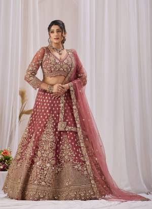 For A Designer Look,Grab These Lehenga Choli in Fine Colored.These Lehenga And Blouse Are Fabricated On Net Pair With Dupatta Are Net.Its Beautified With Heavy Designer Embroidery Work.