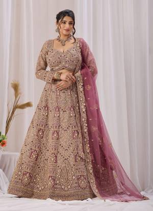 For A Designer Look,Grab These Lehenga Choli in Fine Colored.These Lehenga And Blouse Are Fabricated On Net Pair With Dupatta Are Net.Its Beautified With Heavy Designer Embroidery Work.