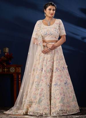For A Designer Look,Grab These Lehenga Choli in Fine Colored.These Lehenga And Blouse Are Fabricated On Net Pair With Dupatta Are Net.Its Beautified With Heavy Designer Embroidery Work.