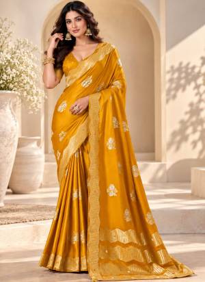 Looking These Party Wear Fancy Saree in Fine Colored Pair With Blouse.These Saree and Blouse Are Fabricated On Satin Tissue.Its Beautified With Wevon Jacquard Designer.
