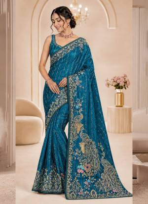 Looking These Party Wear Fancy Saree in Fine Colored Pair With Blouse.These Saree and Blouse Are Fabricated On Satin.Its Beautified With Wevon Designer With Swarovski Work.