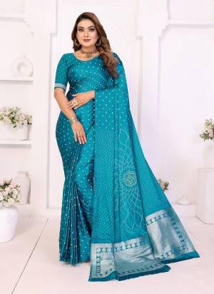 Attractive These Festive And Party Wear Saree in Fine Colored.These Saree And Blouse is Fabricated On Satin Silk.Its Beautified With Weaving Jari Pallu Designer With Dabby Bandhej Saree.