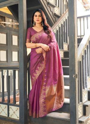 Garb These Festive And Party Wear Saree in Fine Colored.These Saree And Blouse is Fabricated On Banarasi Raw Silk.Its Beautified With Woven Golden Jari Temple Designer.