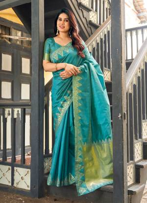Garb These Festive And Party Wear Saree in Fine Colored.These Saree And Blouse is Fabricated On Banarasi Raw Silk.Its Beautified With Woven Golden Jari Temple Designer.