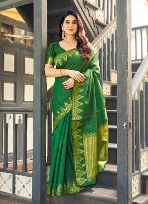 Garb These Festive And Party Wear Saree in Fine Colored.These Saree And Blouse is Fabricated On Banarasi Raw Silk.Its Beautified With Woven Golden Jari Temple Designer.