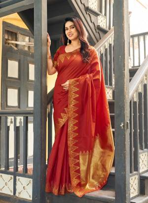 Garb These Festive And Party Wear Saree in Fine Colored.These Saree And Blouse is Fabricated On Banarasi Raw Silk.Its Beautified With Woven Golden Jari Temple Designer.