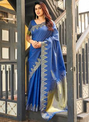 Garb These Festive And Party Wear Saree in Fine Colored.These Saree And Blouse is Fabricated On Banarasi Raw Silk.Its Beautified With Woven Golden Jari Temple Designer.