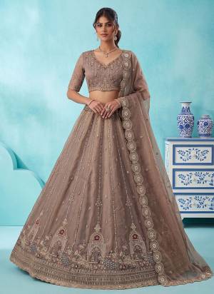 For A Fancy Designer Look,Grab These Lehenga Choli With Dupatta in Fine Colored.These Lehenga And Choli Are Silk And Dupatta Are Fabricated On Silk Pair.Its Beautified With Peacock Jari,Sequance,Multy Thread Embroidery,Crystel Hand Work. 