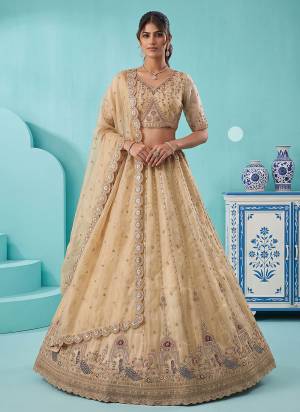For A Fancy Designer Look,Grab These Lehenga Choli With Dupatta in Fine Colored.These Lehenga And Choli Are Silk And Dupatta Are Fabricated On Silk Pair.Its Beautified With Peacock Jari,Sequance,Multy Thread Embroidery,Crystel Hand Work. 