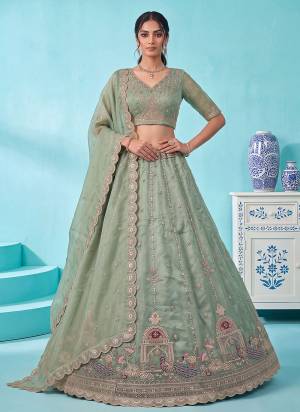 For A Fancy Designer Look,Grab These Lehenga Choli With Dupatta in Fine Colored.These Lehenga And Choli Are Silk And Dupatta Are Fabricated On Silk Pair.Its Beautified With Peacock Jari,Sequance,Multy Thread Embroidery,Crystel Hand Work. 