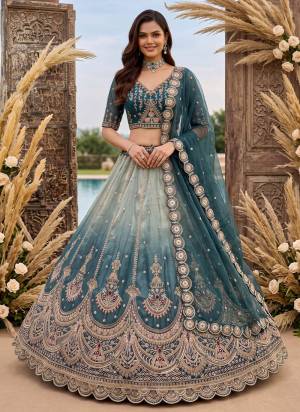 For A Fancy Designer Look,Grab These Lehenga Choli With Dupatta in Fine Colored.These Lehenga And Choli Are Chandaniya Silk And Dupatta Are Fabricated On Chandaniya Silk Pair.Its Beautified With Jari,Sequance,Multy Thread Embroidery,Crystel Hand Work. 