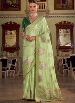 Looking These Party Wear Saree in Fine Colored Pair With Blouse.These Saree and Blouse Are Fabricated On Satin Silk.Its Beautified With Woven Designer With Sarovsaki Work.