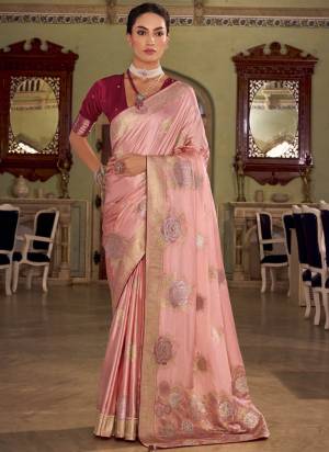 Looking These Party Wear Saree in Fine Colored Pair With Blouse.These Saree and Blouse Are Fabricated On Satin Silk.Its Beautified With Woven Designer With Sarovsaki Work.