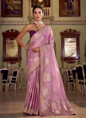 Looking These Party Wear Saree in Fine Colored Pair With Blouse.These Saree and Blouse Are Fabricated On Satin Silk.Its Beautified With Woven Designer With Sarovsaki Work.