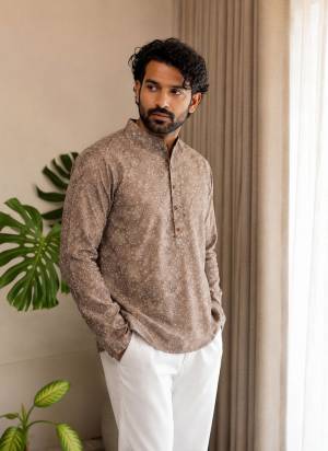 For A festive Wear,Grab These Readymade Short Kurta in Fine Colored.These Kurta is Fabricated On Linen With Designer Printed.Buy Now.