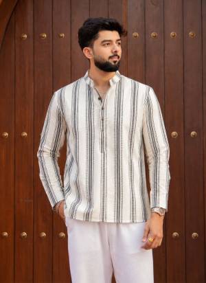 For A festive Wear,Grab These Readymade Short Kurta in Fine Colored.These Kurta is Fabricated On Swiss Linen With Designer Printed.Buy Now.