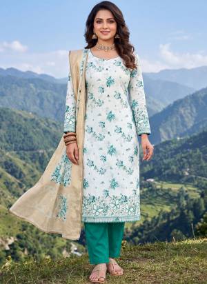 Grab These Suit in Fine Colored Pair With Bottom And Dupatta.These Top Are Jam Cotton And Dupatta Are Fabricated On Nazmin Pair With Rayon Bottom.Its Beautified With Designer Printed, Bits Hand Work.