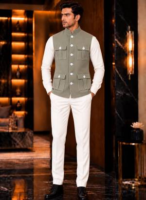 Looking These Party Wear Mans Wear Pocket Koti wearing this fashionable. This Koti Are Lachka Silk Fabriced With Sold Designer.