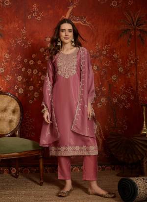 Looking These Prty Wear Salwar Suit in Fine Colored Pair With Bottom And Dupatta.These Top Are Silk And Bottom Are Fabricated On Santoon Pair With Silk Dupatta.Its Beautified With Designer Embroidery Work.