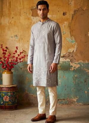 Looking These Party Wear Mans Wear Kutra Payjama in Fine Color. These Kurta Are Silk And Payjama Cotton Fabriced With Designer Embroidery Work .