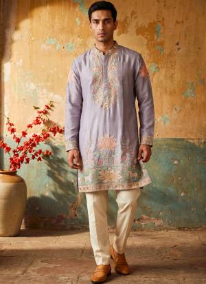 Looking These Party Wear Mans Wear Kutra Payjama in Fine Color. These Kurta Are Silk And Payjama Cotton Fabriced With Designer Embroidery Work .