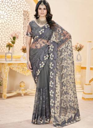 Attactive These Festive Wear Saree in Fine Colored.These Saree And Blouse is Fabricated On Butterfly Net.Its Beautified With Designer Chain Stitched Embroidery With Stone Work.