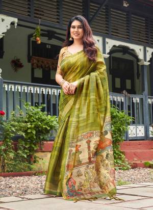 Looking These Festive And Party Wear Saree in Fine Colored.These Saree And Blouse is Fabricated On Tissue Silk.Its Beautified With Designer Kalamkari,Zigzag Lahariya Printed.