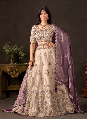 For A Designer Look,Grab These Lehenga Choli in Fine Colored.These Lehenga Are Fendy And Blouse Are Fabricated On Fendy Pair With Dupatta Are Fendy.Its Beautified With Designer Dori,Thread,Jari,Sequance Embroidery Work.