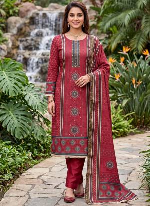 Grab These Suit in Fine Colored Pair With Bottom And Dupatta.These Top Are Cotton Silk And Dupatta Are Fabricated On Cotton Silk Pair With Dull Santoon Bottom.Its Beautified With Designer Digital Printed, Hand Work.