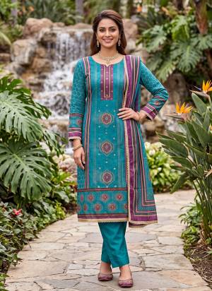 Grab These Suit in Fine Colored Pair With Bottom And Dupatta.These Top Are Cotton Silk And Dupatta Are Fabricated On Cotton Silk Pair With Dull Santoon Bottom.Its Beautified With Designer Digital Printed, Hand Work.