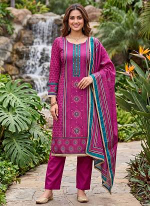 Grab These Suit in Fine Colored Pair With Bottom And Dupatta.These Top Are Cotton Silk And Dupatta Are Fabricated On Cotton Silk Pair With Dull Santoon Bottom.Its Beautified With Designer Digital Printed, Hand Work.