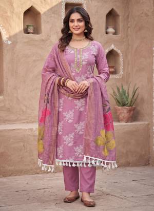 Grab These Suit in Fine Colored Pair With Bottom And Dupatta.These Top Are Cotton Silk And Dupatta Are Fabricated On Cotton Silk Pair With Dull Santoon Bottom.Its Beautified With Designer Digital Printed, Hand Work.