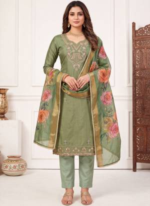 Grab These Suit in Fine Colored Pair With Bottom And Dupatta.These Top Are Cotton Silk And Dupatta Are Fabricated On Cotton Silk Pair With Dull Santoon Bottom.Its Beautified With Designer Digital Printed, Hand Work.