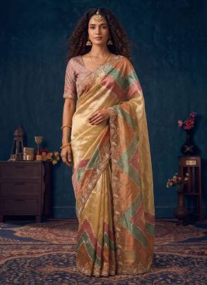 Look Attrective These Designer Party Wear Saree in Fine Colored.These Saree Are Organza Silk And Blouse Are Raw Silk is Fabricated.Its Beautified Desiger Zarka,Beads Work.