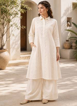 Attrective These Beautiful Looking Readymade Top With Bottom Set.These Top And Bottom Fabricated On Cotton.Its Beautified With Designer Schiffli Embroidery Work.