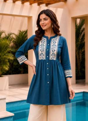 Garb These Beautiful Looking Readymade Tunic Kurti.These Kurti Are Fabricated On Dabu Cotton.Its Beautified With Designer Embroidery Work.