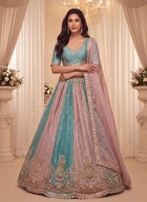 For A Fancy Designer Look,Grab These Lehenga Choli With Dupatta in Fine Colored.These Lehenga And Choli Are Silk And Dupatta Are Fabricated On Silk Pair.Its Beautified With Sequance,Thread Embroidery,Beads Work. 