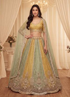 For A Fancy Designer Look,Grab These Lehenga Choli With Dupatta in Fine Colored.These Lehenga And Choli Are Silk And Dupatta Are Fabricated On Silk Pair.Its Beautified With Sequance,Thread Embroidery,Beads Work. 
