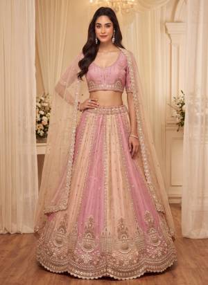 For A Fancy Designer Look,Grab These Lehenga Choli With Dupatta in Fine Colored.These Lehenga And Choli Are Silk And Dupatta Are Fabricated On Silk Pair.Its Beautified With Sequance,Thread Embroidery,Beads Work. 