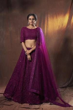 Heavy Designer Lehenga Choli In Light Fancy Color Fabricated On Soft Net Beautified With Heavy Attractive Embroidery. Buye Now.
