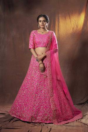 Heavy Designer Lehenga Choli In Light Fancy Color Fabricated On Soft Net Beautified With Heavy Attractive Embroidery. Buye Now.