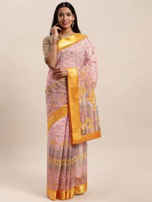 Adorn The Pretty Angelic Look Wearing This Saree In Color Paired With Contrasting Colored Blouse. This Saree Is Fabricated On Cotton Paired With Cotton Fabricated Blouse. Its Printed Pretty Color Pallete Will Give An Attractive Look To Your Personality. 