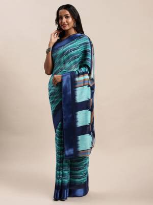 Adorn The Pretty Angelic Look Wearing This Saree In Color Paired With Contrasting Colored Blouse. This Saree Is Fabricated On Cotton Paired With Cotton Fabricated Blouse. Its Printed Pretty Color Pallete Will Give An Attractive Look To Your Personality. 