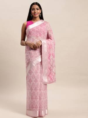 Adorn The Pretty Angelic Look Wearing This Saree In Color Paired With Contrasting Colored Blouse. This Saree Is Fabricated On Cotton Paired With Cotton Fabricated Blouse. Its Printed Pretty Color Pallete Will Give An Attractive Look To Your Personality. 