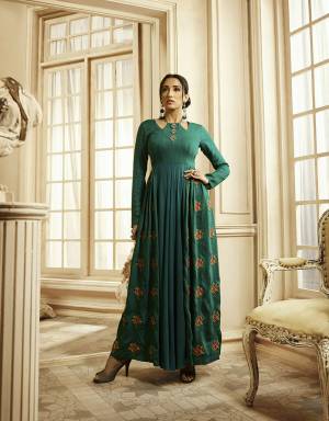 Flaunt Your Rich And Elegant Taste Wearing This Designer Readymade Long Gown In Fine Color. This  Pretty Gown Is Fabricated On Rayon Cotton Beautified With Thread Work And Hand Work . Its Fabric Is Soft Towards Skin And Easy To Carry All Day Long. 