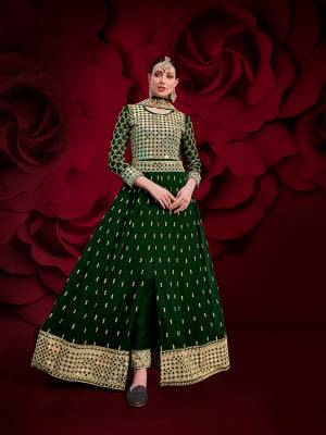 Enhance Your Personality Wearing This Designer Dress In Dark Color With Front & Back Pattern And Straight Pants. Its Heavy Embroidered Top Is Fabricated On Georgette Paired With Santoon Bottom And Net Fabricated Dupatta. All Its Fabrics Are Light Weight , Durable And Esnures Superb Comfort Throughout The Gala. Buy Now. Less

