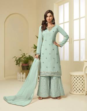 Attract All Wearing This Designer Suit In Fine Color. Its Pretty Top Is Fabricated On Georgette Paired With Georgette Fabricated Bottom and Net Dupatta. This Suit's Top, Bottom And Dupatta Are Beautified With Detailed Heavy Embroidery. Buy This Pretty Piece Now.