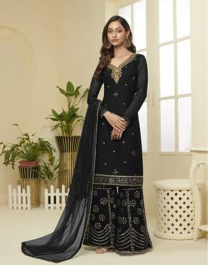 Attract All Wearing This Designer Suit In Fine Color. Its Pretty Top Is Fabricated On Georgette Paired With Georgette Fabricated Bottom and Net Dupatta. This Suit's Top, Bottom And Dupatta Are Beautified With Detailed Heavy Embroidery. Buy This Pretty Piece Now.