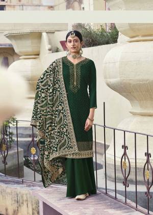 Attract All Wearing This Designer Suit In Fine Green Color. Its Pretty Top Is Fabricated On Georgette In Embroidery And Diamond Paired With Santoon Fabricated Bottom and Georgette In Heavy Embroidery Dupatta. Buy This Pretty Piece Now.